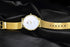 "Golden Fashion Quartz Watch – Circular Dial with Stainless Steel Clasp"